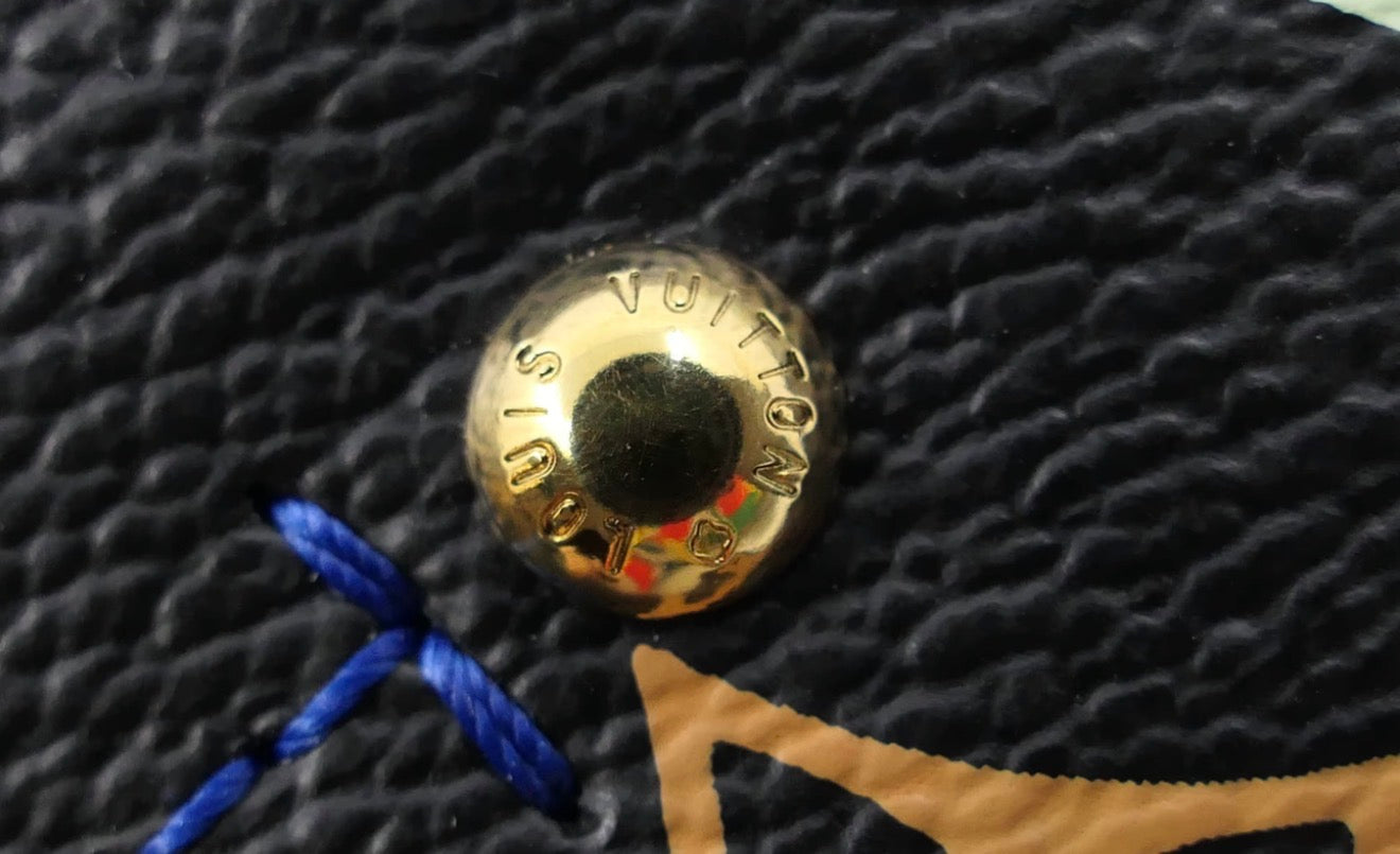 Louis Vuitton x Takashi Murakami Heartbreaker in Multi Color monogram on black canvas with blue interior