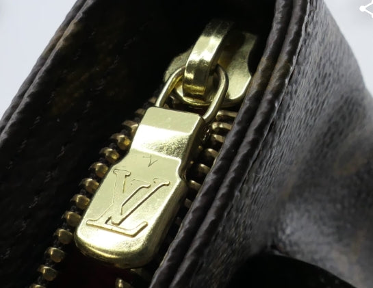 Louis Vuitton Partiton Wristlet in Monogram Canvas