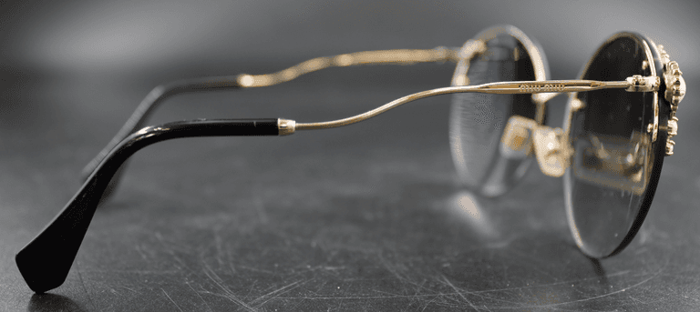 Miu Miu "Pearl Collection"; SMU52TS