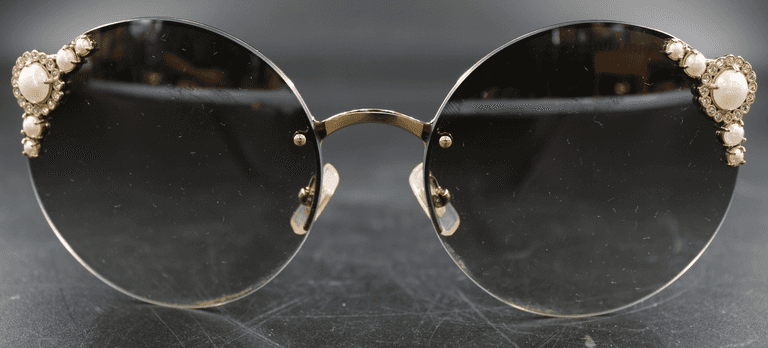 Miu Miu "Pearl Collection"; SMU52TS